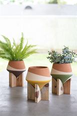 POTTERY DIPPED ON WOOD BASE 10X7.5"